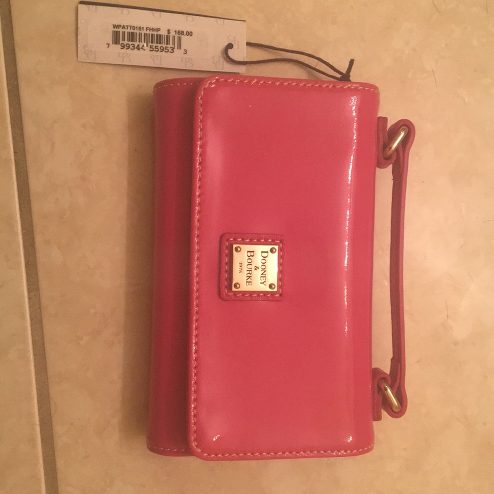 Pink patten leather clutch